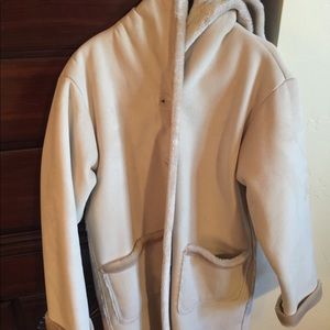 Cream jacket. Fuzzy inside.